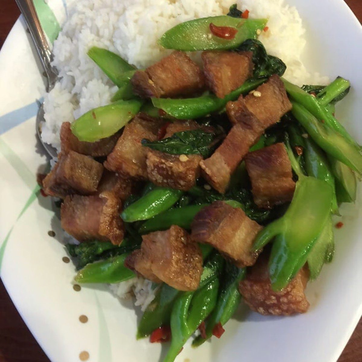Chinese Broccoli and Crispy Pork Over Rice.